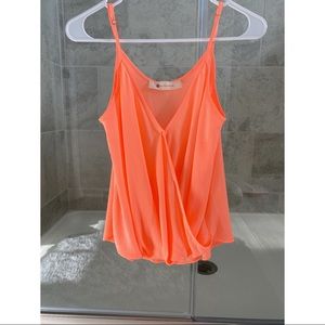 Bright orange top